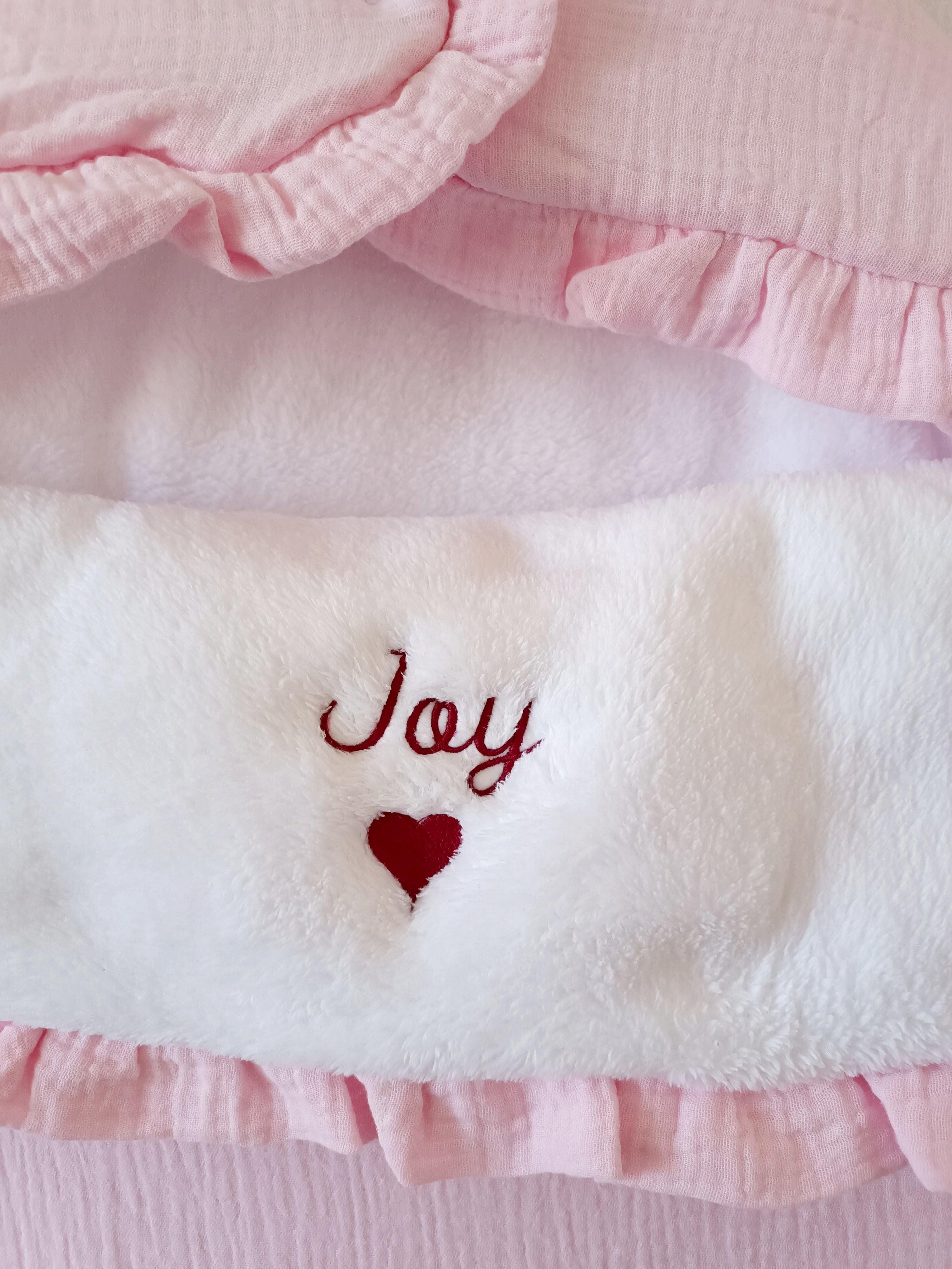 Nid d'ange en gaze de coton et polaire rose