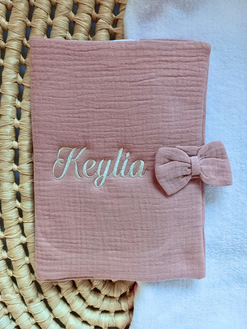 Personalised baby health record cover in cotton gauze – With bow