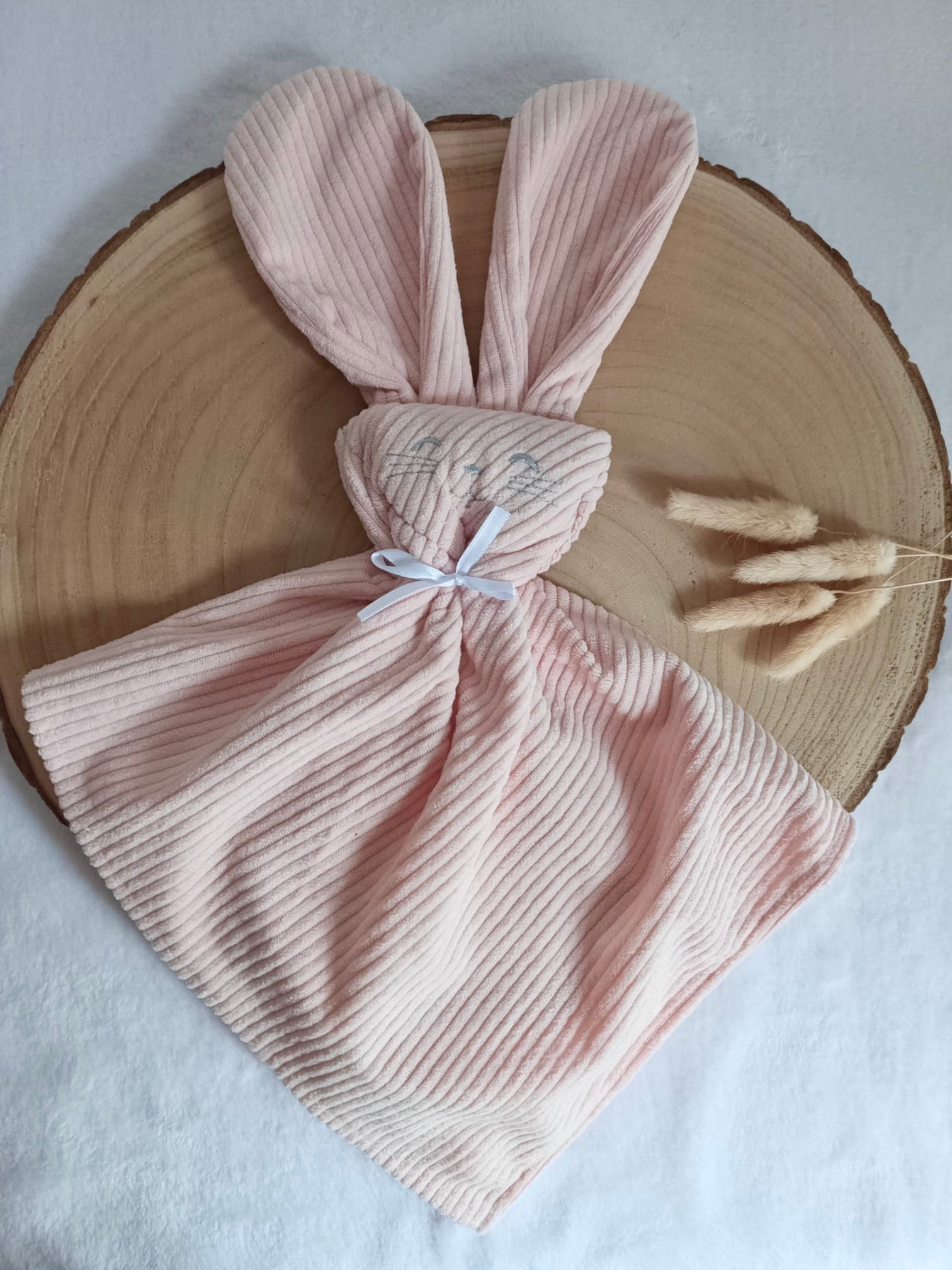 Doudou lapin yeux avec oreilles velours rose