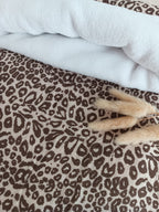 Couverture en gaze de coton et polaire beige léopard