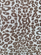 Nid d'ange en gaze de coton et polaire blanc léopard