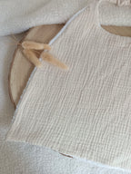 Bavoir en gaze de coton beige