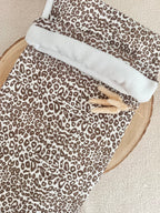 Couverture en gaze de coton et polaire blanc léopard