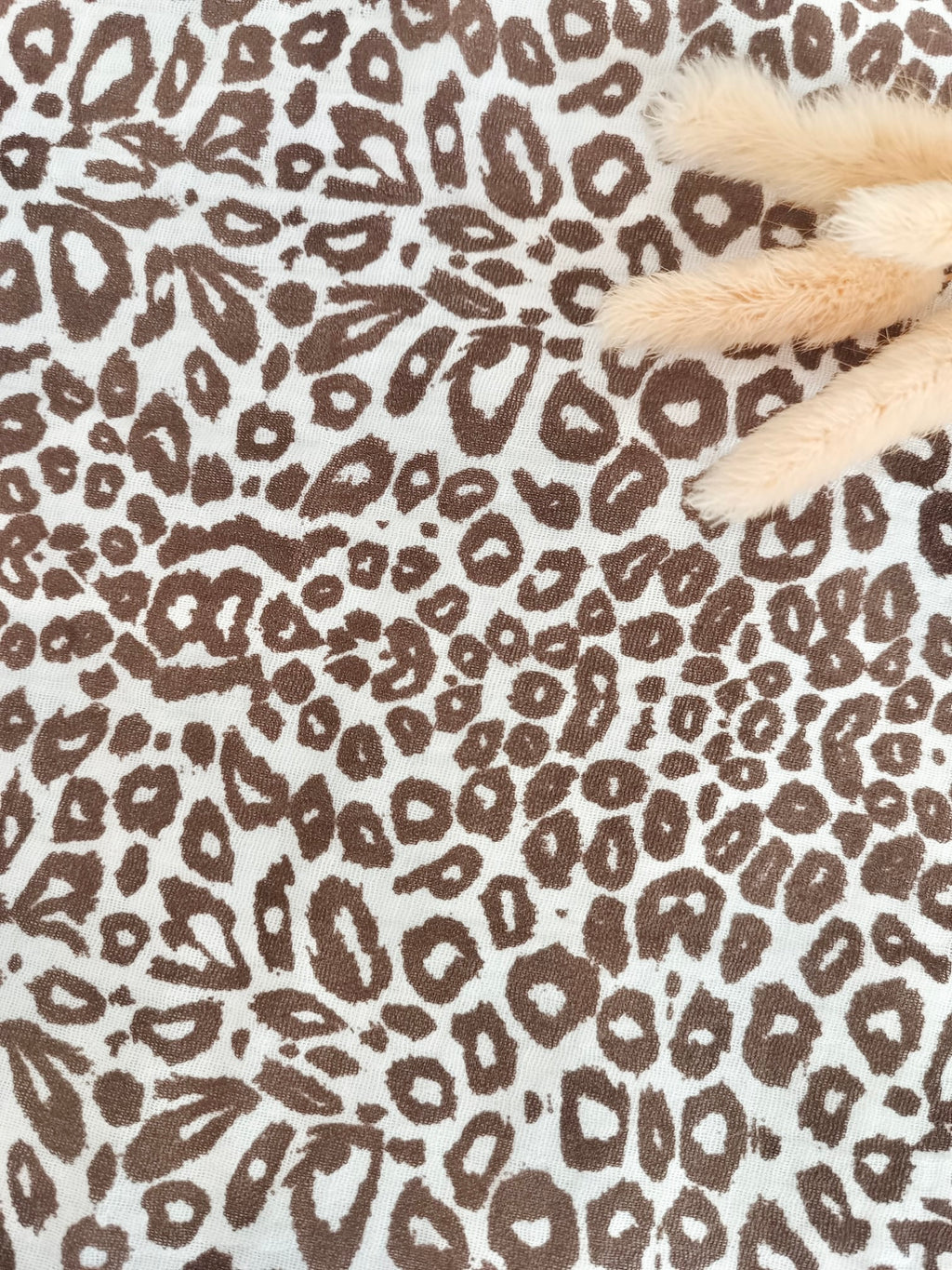 Couverture en gaze de coton et polaire blanc léopard