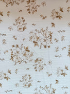 Couverture en gaze de coton et polaire fleurs de coton tons beige/marron