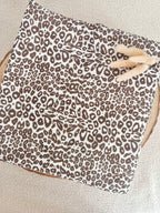 Couverture en gaze de coton et polaire blanc léopard