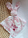 Doudou lapin en gaze de coton safari tons rose/fushia - personnalisable -