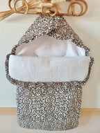 Nid d'ange en gaze de coton et polaire blanc léopard