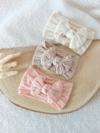 Lot bandeaux élastiques rose/motif fleurs/crème TU