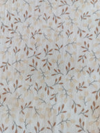 Nid d'ange en gaze de coton blanc  fleurie tons beige/marron